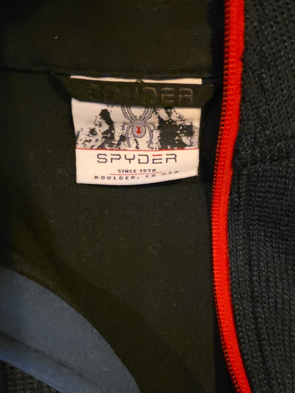 Spyder Navy Blue Jacket with Red Zipper Trim